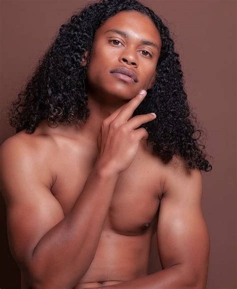 12 Standout Curly Hairstyles For Black Men 2024 Trends