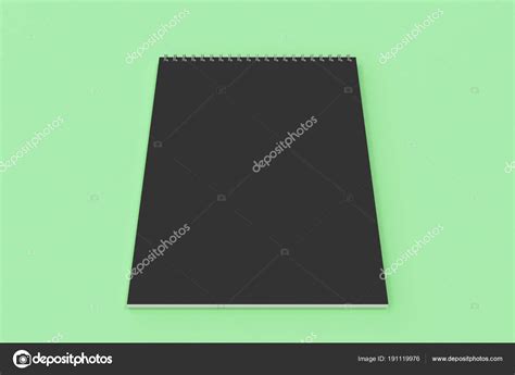 Blank Black Notebook With Metal Spiral Bound On Green Background Stock