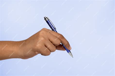 Premium Psd Hand Holding Pen Mock Up