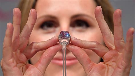 'Pink legacy' diamond sells for $50m at auction | World News | Sky News