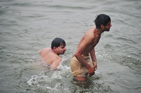 Bathing Naked With His Wife At The River