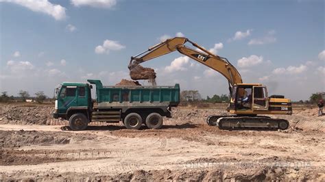 អិចជីកដីដាក់ឡាន Cat320b Excavator Loading Trucks Youtube