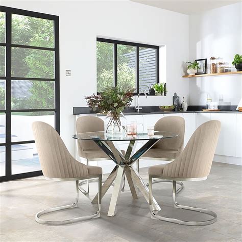 Plaza Round Dining Table And 4 Riva Chairs Glass And Chrome Champagne