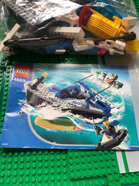 LEGO JUNIORS TURBO CHARGED POLICE BOAT 4669 100 COMPLETE