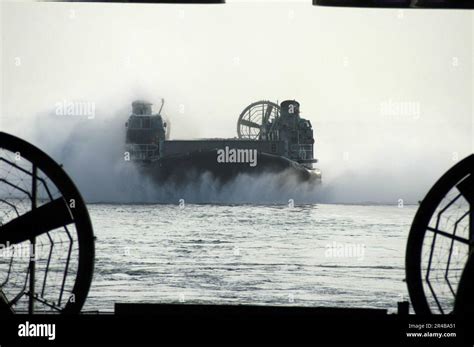 US Navy A Landing Craft Air Cushion LCAC Prepares To Enter The Well