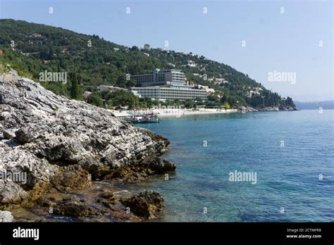 Hotel on the beach in Corfu Stock Photo - Alamy