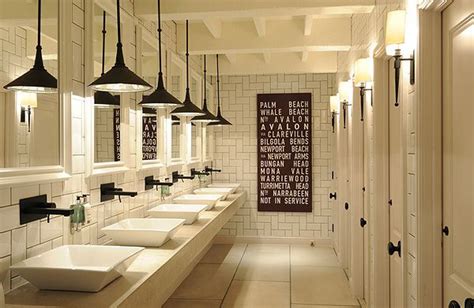 Classic Bathroom Design With Sinks And Hanging Lights