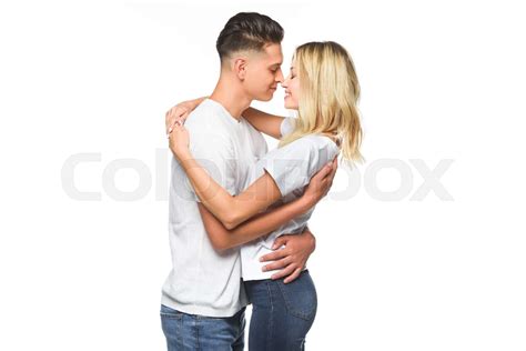 Affectionate Couple Embracing And Going To Kiss Isolated On White Stock Image Colourbox