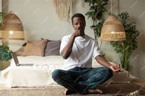 Premium Photo Young African Man Practicing Yoga Lesson Doing