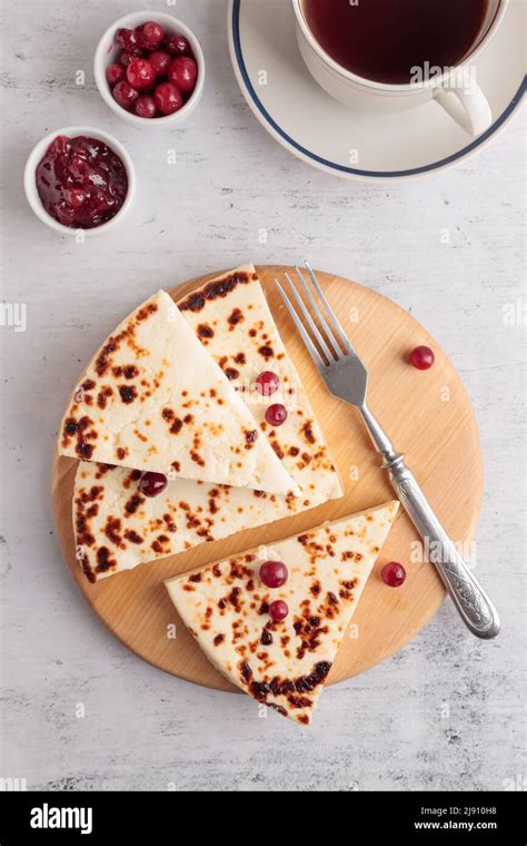 Leipajuusto Traditional Finnish Baked Cheese With Red Berries Stock