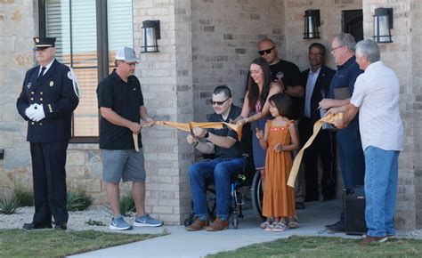 Lubbock firefighter Matt Dawson gets keys to new mortgage-free home