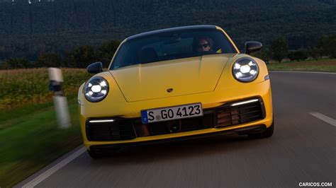 2020 Porsche 911 Carrera Coupe (Color: Racing Yellow) - Front | Caricos