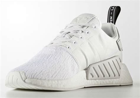 adidas NMD R2 Primeknit Triple White | SneakerNews.com