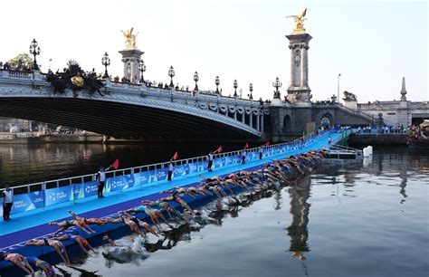 Olympic Triathletes Test Swimming In The Seine