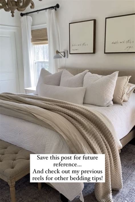 A Bed With White Sheets And Pillows In A Bedroom