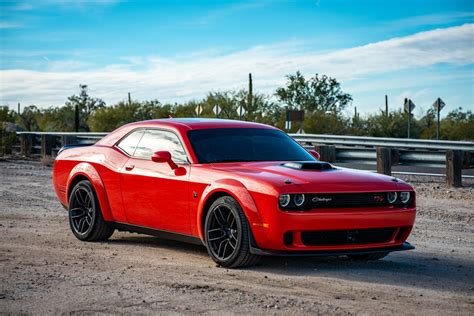 Red Chevrolet Camaro on Road · Free Stock Photo