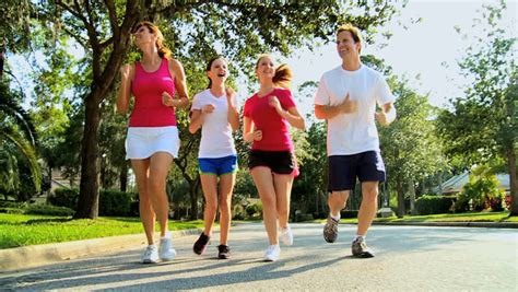 Three Fit Young People Keeping Fit Jogging Together Stock Footage Video