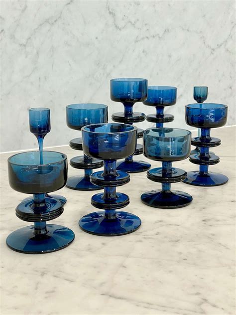 Large Set Of 1970s Wedgwood Navy Glass Candlesticks In Antique Coloured Glass