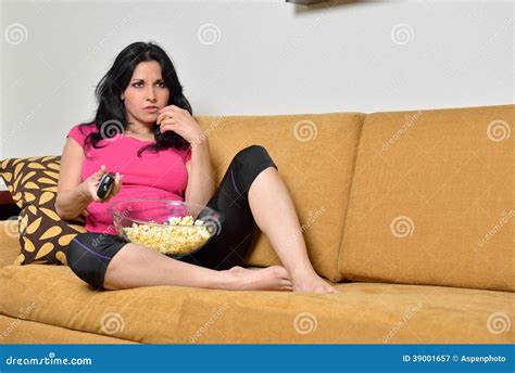 Eating Popcorn On Couch Tv Remote Control Stock Image Image Of