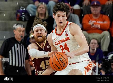 Clemson Center Pj Hall 24 And Boston College Guard Mason Madsen 45