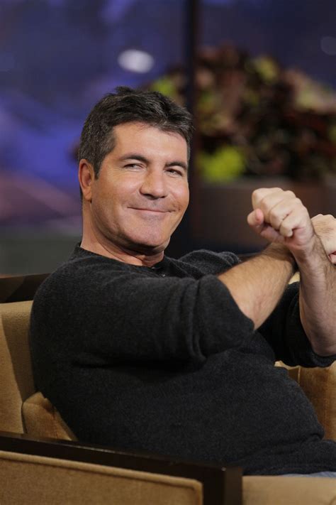 Simon Cowell Removed His Facial Fillers After His Son Had 'Hysterics