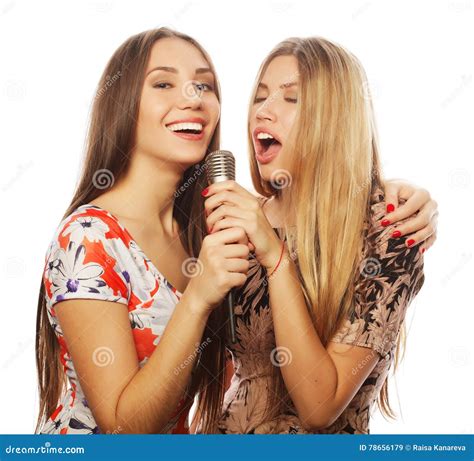 Two Young Girls Singing Karaoke Royalty-Free Stock Photography ...