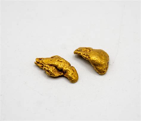 PAIR OF GOLD NUGGETS - SCRAP 6.66 GRAMS - Kastner Auctions