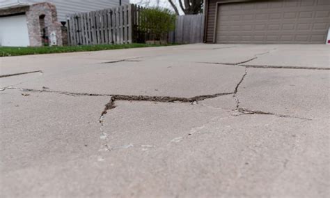 How To Repair Large Concrete Driveway Cracks By Spragueexcavating Medium