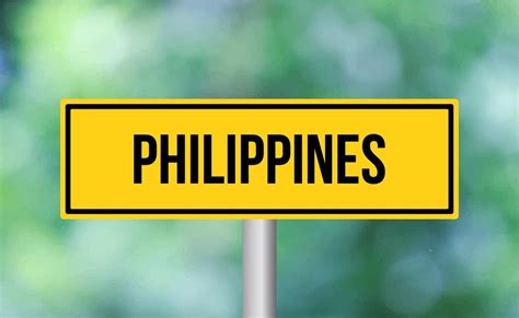 premium photo philippines road sign  blur background