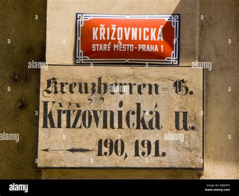 Old and new street signs with blackletter gothic German Czech and ...