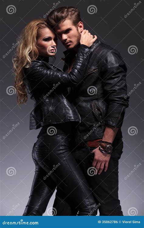 Young Dramatic Couple Standing Embraced Stock Photo Image Of Close