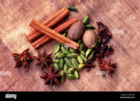 Spices Star Anise Cardamom Cloves Cinnamon Nutmeg Stock Photo Alamy