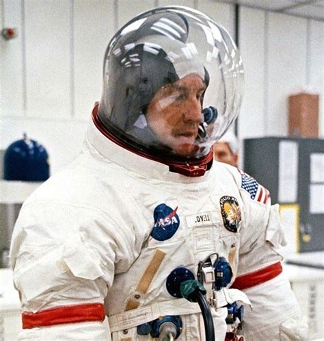 Apollo 13 commander Jim Lovell suiting for launch on April 11, 1970 ...