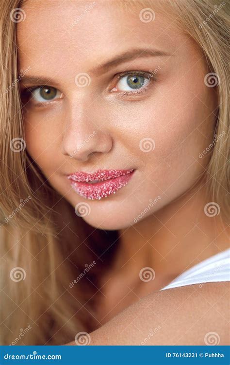 Beauty Face Beautiful Woman With Full Lips With Sugar Lip Scrub Stock