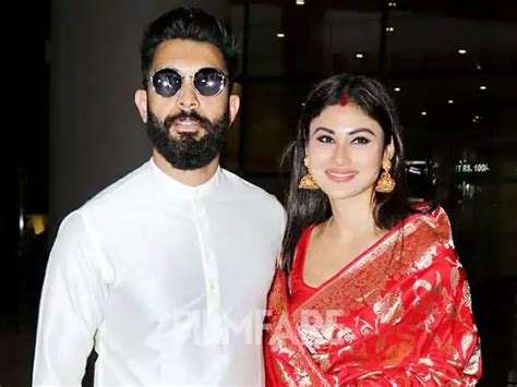 Photos: Newlyweds Mouni Roy, Suraj Nambiar return to Mumbai | Filmfare.com