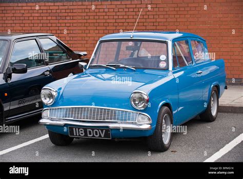 Blue Ford Anglia restored classic British motorcar Stock Photo - Alamy