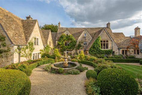 A Sprawling Home Where Cotswolds Stone And Ancient Beams Meet Neon