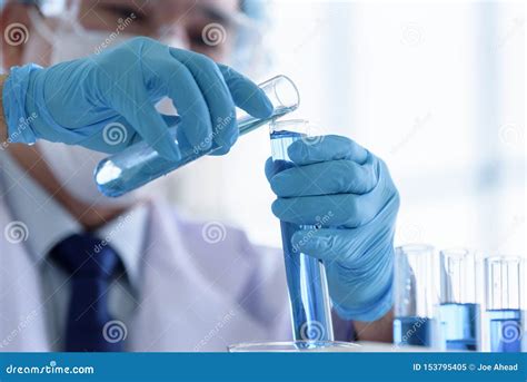 Asian Man Scientist Researching And Learning In A Laboratory Stock