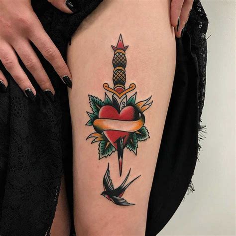 Traditional heart and dagger by Łukasz Krupiński - Tattoogrid.net