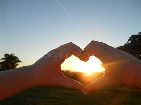 Sunset Heart Hands Stock Photos - Download 3,066 Royalty Free Photos