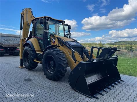 Koparko Adowarka Caterpillar F Years Black Edition Na Sprzeda