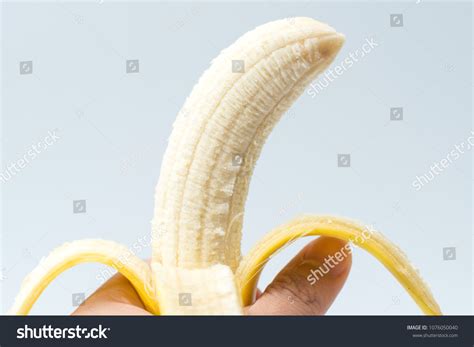 Human Hand Holding Banana Fruit Nutrition Stock Photo 1076050040