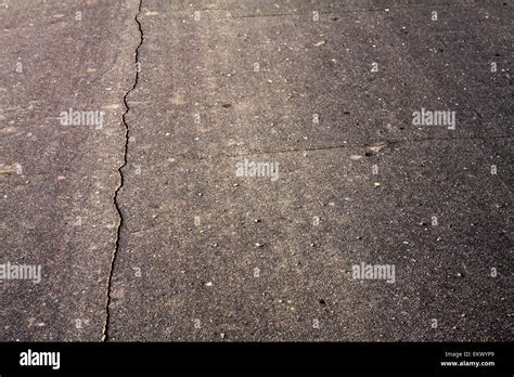 cracked asphalt background Stock Photo - Alamy