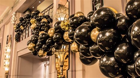 Black and gold balloon garland