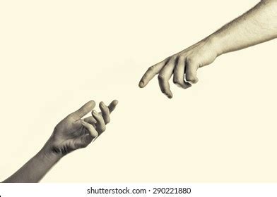 Two Hands Reaching Toward Each Other Stock Photo Shutterstock