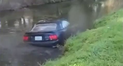 Driver Suffers Medical Episode Crashes Mustang Into Canal In Florida