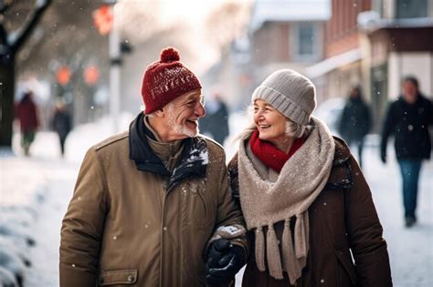 Premium Photo Elderly Senior Couple Walking Through A Snowy Town An