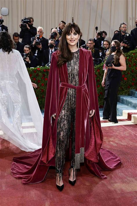Dakota Johnson Wore a Sheer Lace Gucci Jumpsuit at the 2022 Met Gala