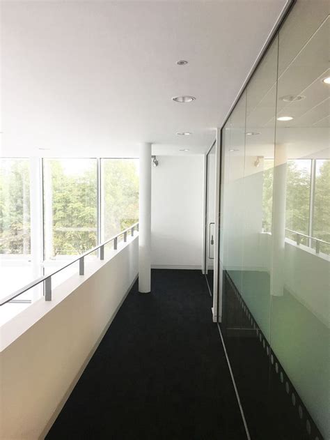 Mezzanine Glass Wall Partition For Atrium For Niftylift Ltd In Milton Keynes Buckinghamshire