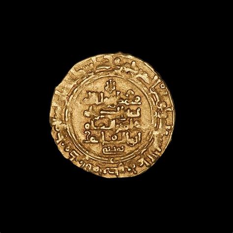 A Rare Ancient Islamic Gold Dinar Coin Dating To Approximately The 7th